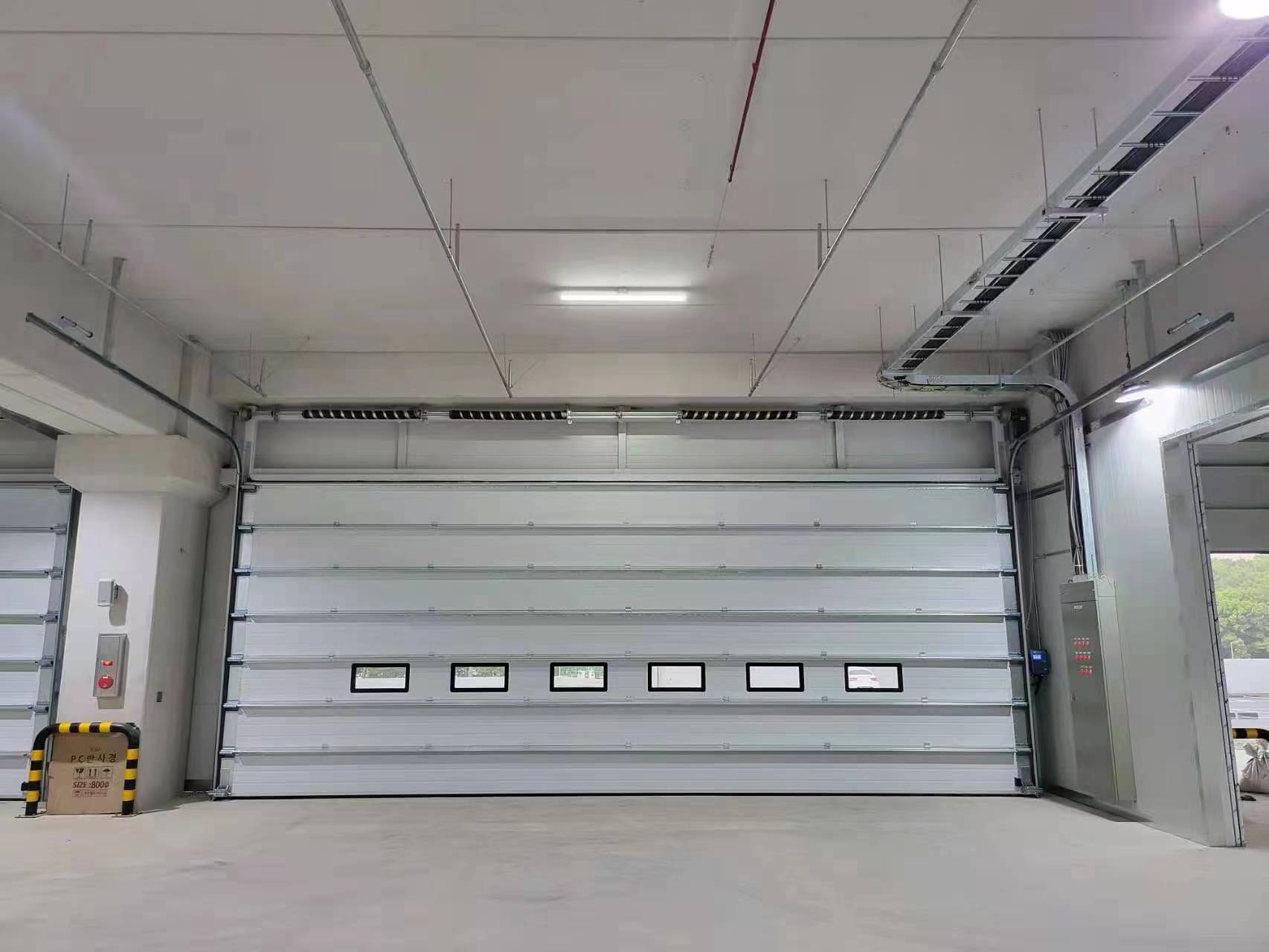 Miért tud egy szekcionált ajtó nemcsak hozzáférési problémákat megoldani?